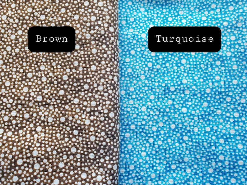 May include: Two fabric swatches with a white polka dot pattern on a brown and turquoise background. The swatches are labeled "Brown" and "Turquoise".