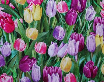 Timeless Tulips. Cotton Fabric. Packed Tulips in Hues of Pink, Purple, and Yellow with Green Leaves & Stems. By the Half Yard, 18"x43" wide.