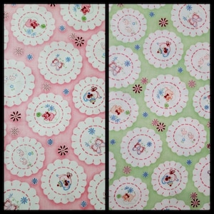 May include: Two fabric swatches with a repeating pattern of teapots, butterflies, and birds. The fabric on the left is pink with white accents. The fabric on the right is green with white accents.