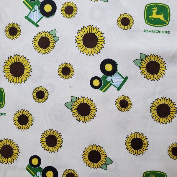 John Deere Sunflower Toss, Cotton Fabric by Springs Creative. JD Logo, Tractors, and Sunflowers on Ivory. By the Half Yard. 18" x 43" wide.