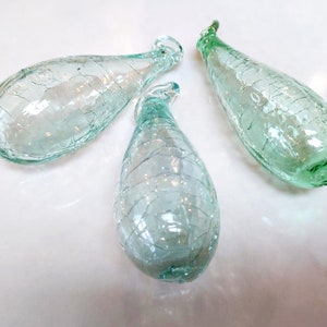 Large (13cm) and Medium (11cm) Teardrop crackled glass baubles, made from 100% recycled glass.