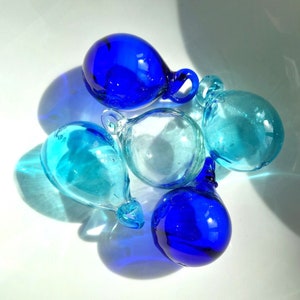 Small (3cm) hand blown glass baubles (set of 5, clear, turquoise and blue) made from 100% recycled glass.
