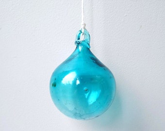 Medium (6cm) turquoise hand-blown glass bauble made from 100% recycled glass.