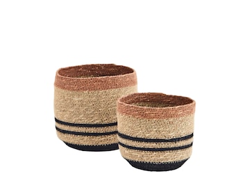 Set of two sea grass baskets with stitching.  Natural and dark tones.