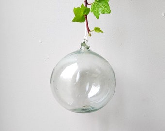 Large (11cm) transparent hand-blown glass bauble made from 100% recycled glass.