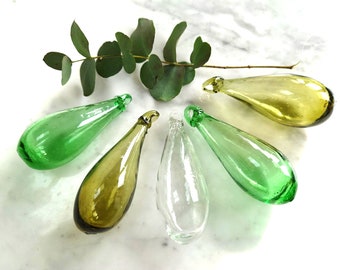 Set of 5 hand blown glass baubles, 10cm drops.  Green, olive and clear.  Made from 100% recycled glass.