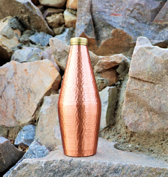 Copper bottle, hand crafted in pure 100% recycled copper and brass.
