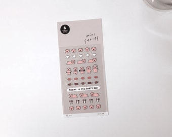 May include: A sheet of clear stickers with pink pig illustrations. The stickers feature pigs in various poses, including sleeping, exercising, and wearing headphones. The text "TODAY IS PIG PARTY DAY" is printed on the sheet.