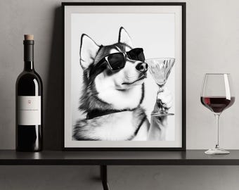 May include: A framed black and white wall art print featuring a husky dog wearing dark sunglasses and holding a martini glass. The print is displayed on a shelf next to a dark wine bottle and a stemmed glass filled with red wine.