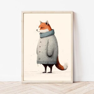 May include: A framed wall art print featuring an illustration of a fox standing in profile. The fox has orange and white fur and is wearing a long, light gray, button-down knit coat with a high ribbed collar. The background is a solid cream color.