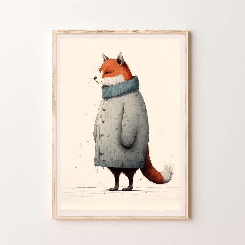May include: A framed wall art print featuring an illustration of a fox with orange and white fur wearing a long, oversized, light gray knit sweater with a high collar and dark buttons, standing against a plain, light cream-colored background.