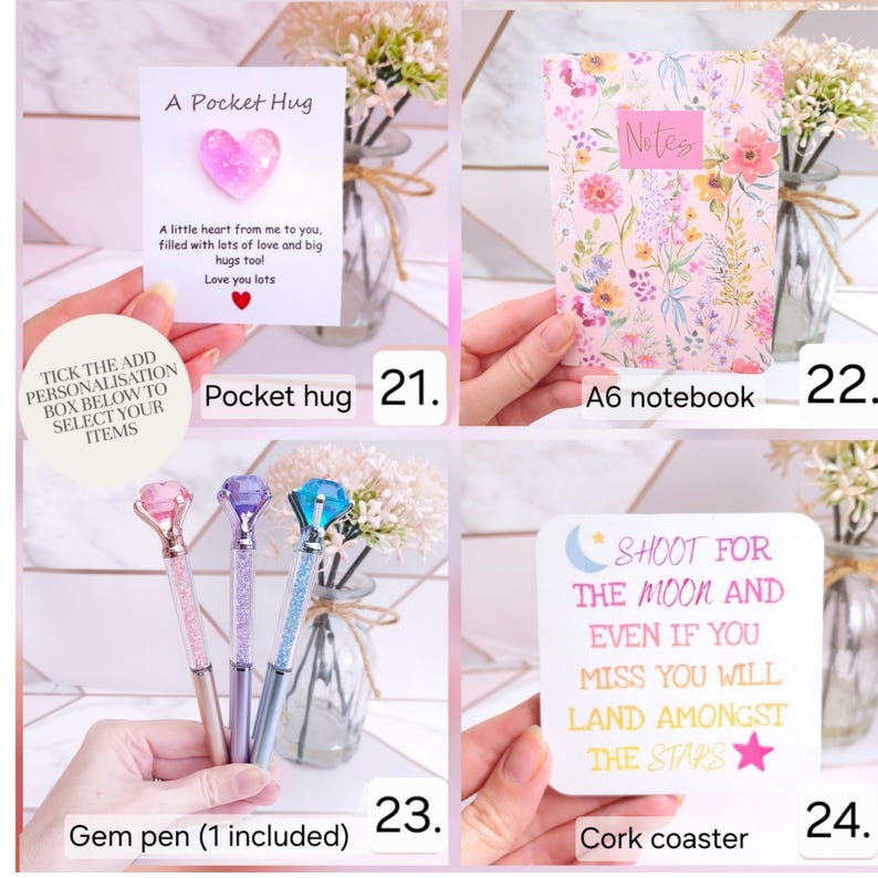 Pode incluir: Uma cole&ccedil;&atilde;o de quatro itens: um cart&atilde;o Pocket Hug com um cora&ccedil;&atilde;o rosa, um caderno A6 floral com o texto Notes, tr&ecirc;s canetas com gema em rosa, roxo e azul, e um porta-copos de corti&ccedil;a quadrado com o texto Shoot for the moon and even if you miss you will land amongst the stars.