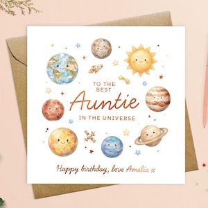 May include: A square greeting card featuring watercolor illustrations of planets, the sun, a rocket, and a satellite. The text reads: TO THE BEST Auntie IN THE UNIVERSE. Below, it says: Happy birthday, love Amelia x. The design uses warm, earthy tones.