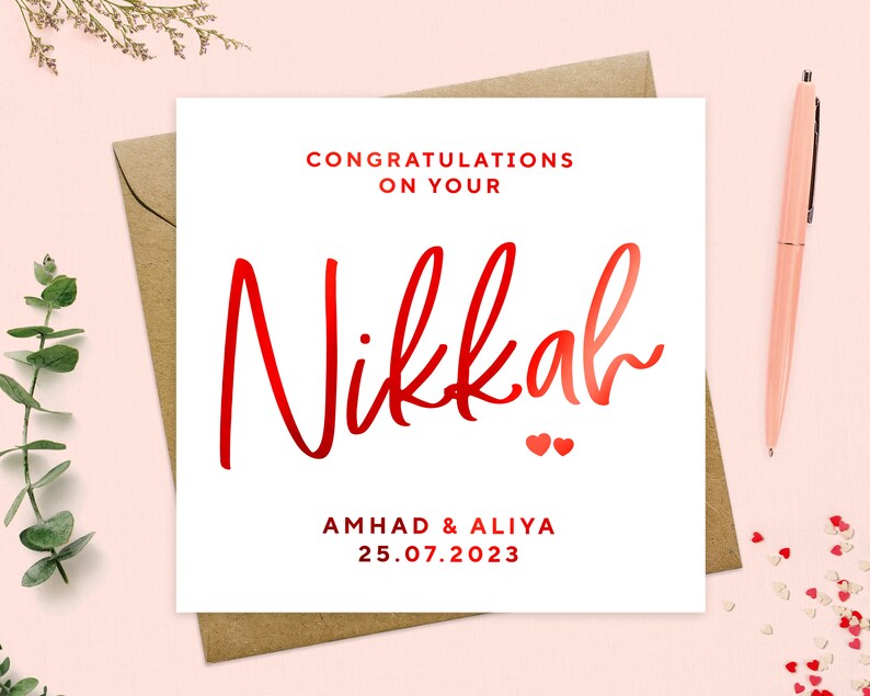 May include: White card with red text that says "Congratulations on your Nikkah" with two small red hearts below the text. The card also includes the names "Ahmad & Aliya" and the date "25.07.2023".