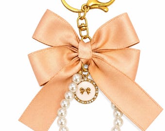 Portachiavi con fiocco e bracciale di perle, ciondolo per borsa in raso, accessorio estetico per borsetta, regalo carino, ciondolo per zaino