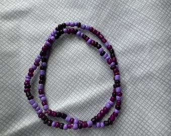 Cavigliera fatta a mano con perline viola: doppio giro