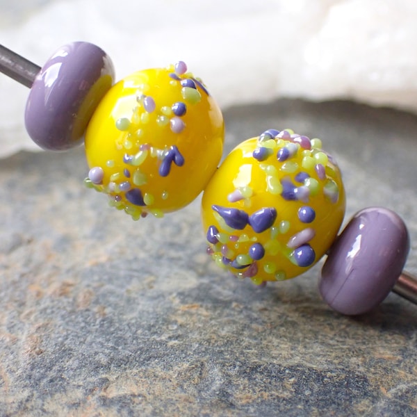 2 lemon yellow background beads with multicolored glass shards and 2 matching spacers for BO spun glass in my workshop