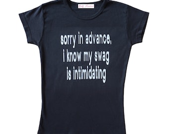 May include: Black t-shirt with the text "sorry in advance, i know my swag is intimidating" printed in white.