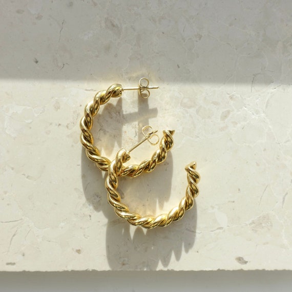 Medium thick deals gold hoop earrings