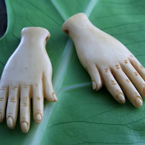 Realistic Hand Pendant Pair Side Drilled Bone Carving Antique Look
