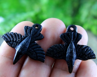 Dijes de cuervo de toro tallados a mano: par de cuentas para pendientes DIY