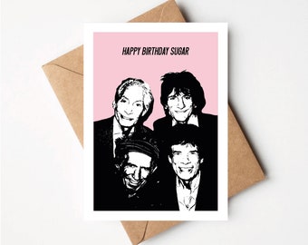May include: A pink birthday card with a black and white image of four men. The card says "Happy Birthday Sugar" at the top.