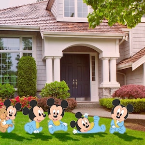 Baby Mickey in different poses cut out and yard signs