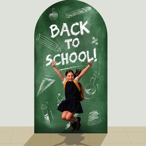 May include: A young girl jumps in front of a green chalkboard with the words "BACK TO SCHOOL!" written in white chalk. The chalkboard is decorated with school-related drawings. The girl wears a backpack and a dark blue dress.