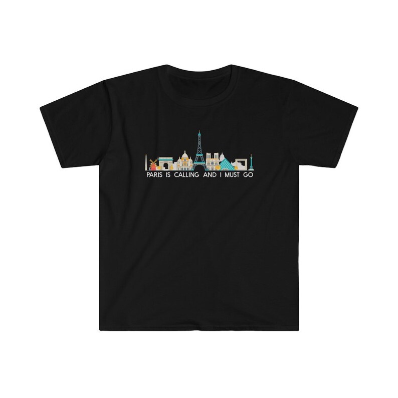May include: Black t-shirt with a skyline of Paris landmarks and the text "Paris is calling and I must go."