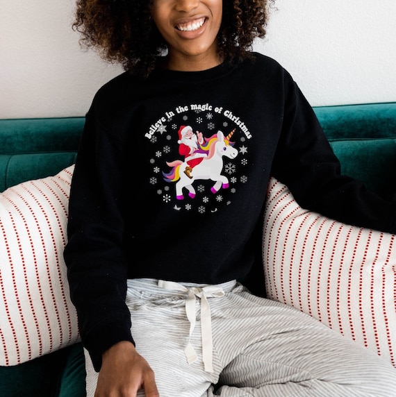 Santa on 2025 unicorn sweater