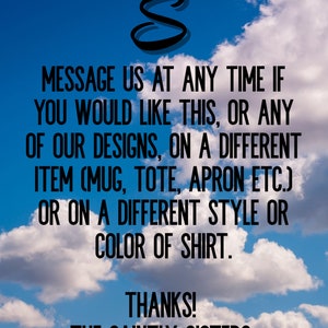 K&ouml;nnte beinhalten: Ein blauer Himmel mit wei&szlig;en Wolken als Hintergrund, der einen schwarzen Buchstaben S mit einem goldenen Heiligenschein zeigt. Der Text lautet: MESSAGE US AT ANY TIME IF YOU WOULD LIKE THIS, OR ANY OF OUR DESIGNS, ON A DIFFERENT ITEM (MUG, TOTE, APRON ETC.) OR ON A DIFFERENT STYLE OR COLOR OF SHIRT. THANKS! THE SAINTLY SISTERS
