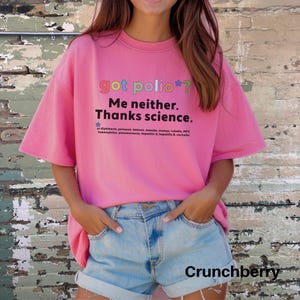 May include: Pink oversized t-shirt with the text "got polio*? Me neither. Thanks science." and a list of preventable diseases.