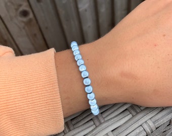 Pulsera de cuentas milagrosas azul bebé