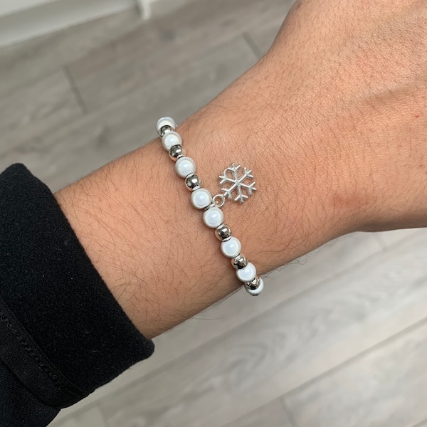 White and silver miracle bead bracelet with snowflake charm