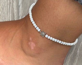 White miracle bead anklet with turtle charm