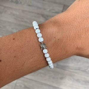 Vitt sköldpadda mirakelpärlarmband