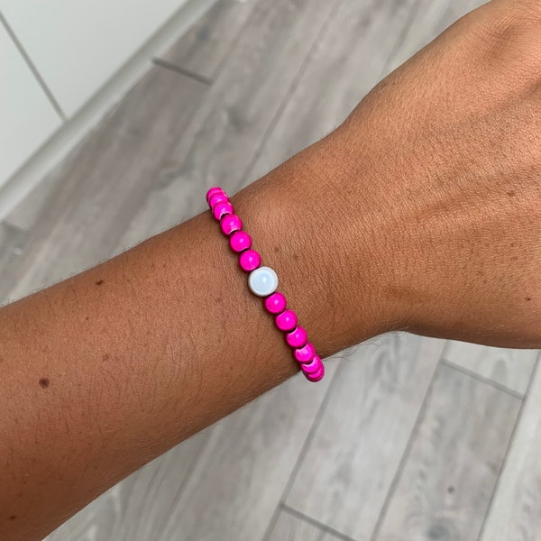 Hot pink and  white miracle bead bracelet
