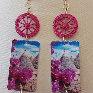 Purple Sicilian pendant earrings with cart wheel and Apulian ones with trulli in steel and wood