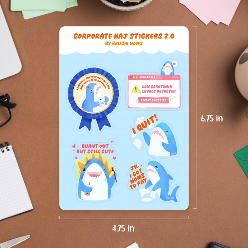 May include: A sticker sheet with shark illustrations and humorous text. The stickers include phrases like "I Quit!" and "Burnt Out But Still Cute." The sheet measures 12.07 cm x 17.15 cm.