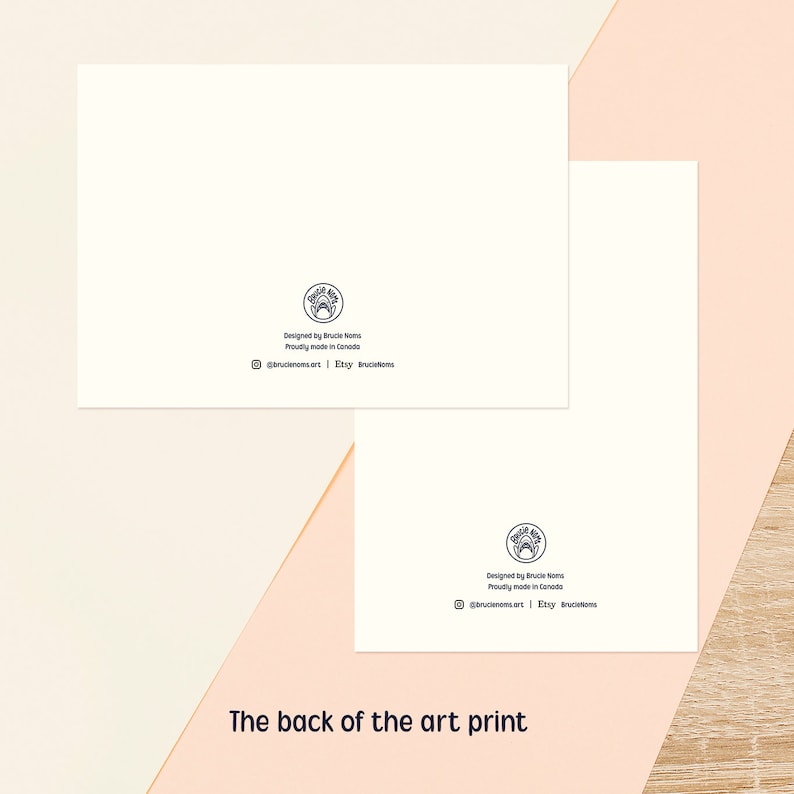 Back of print
Reverse side of a mini art print postcard showing a clean white card with small branding detail