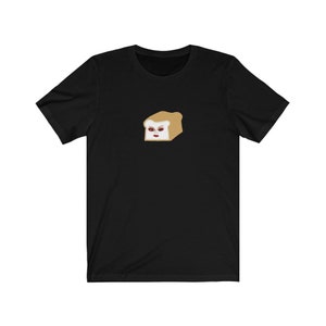 May include: Black t-shirt with a cartoon image of a slice of bread with a face. The bread is brown and white.
