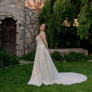 Simple Sparkly Aline Wedding Dress with Sweetheart Neckline & Pockets - Elegant and Glamorous Gown