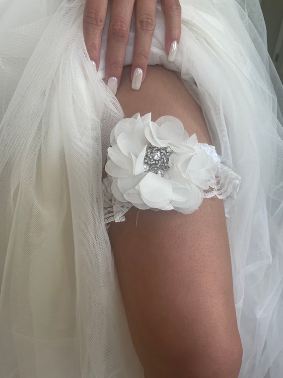 Stretch Garter Belt with a large chiffon flower and lace trim, rhinetone center of flower, satin covered elastic band