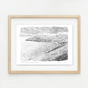 May include: Black and white pen and ink drawing of a coastal landscape with a bay, hills, and a cloudy sky. The drawing is framed in a light wood frame. The text "KEEM BAY, ARAN ISLANDS, CO. GALWAY, AUGUST 2019" is printed below the image.