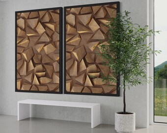May include: Two framed abstract art prints with a geometric pattern of brown and gold shapes. The prints are hanging on a white wall above a white bench. A potted green plant is in the corner of the room.