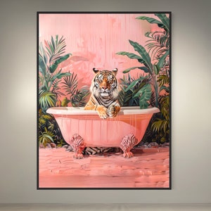 May include: A tiger sits in a pink bathtub surrounded by lush green tropical plants. The bathtub is dripping with water and the tiger is looking directly at the viewer.