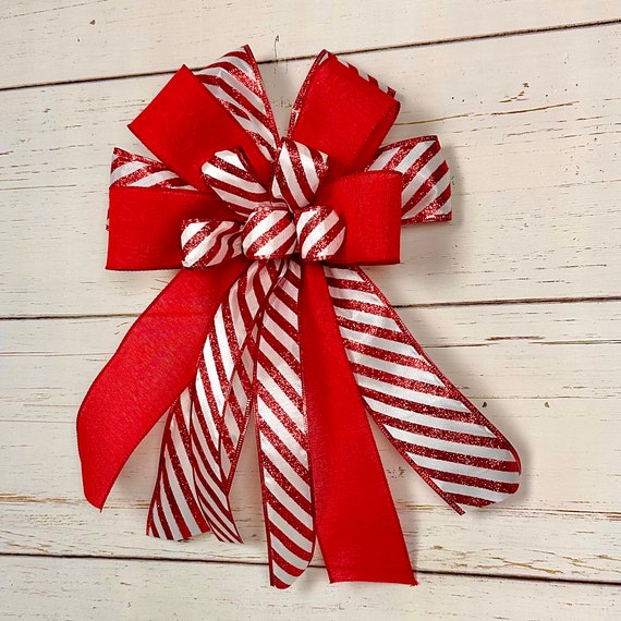 Holiday candy cans red white satin fur oversized flower headband bow Amazon.com: Candy Cane Headband with Bows, Red : Clothing  main image 3