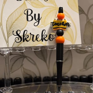 Black and orange teacher focal bead pencil bead teacher silicone bead beaded pen