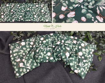 Spelled heat pads in different sizes with eucalyptus/cotton motif in green