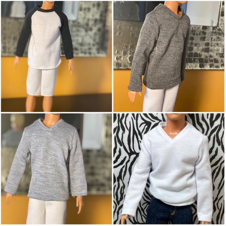 May include: Four different long-sleeved shirts for dolls. The shirts are in white, gray, and black. The shirts have a V-neck and are made of a soft, comfortable fabric.
